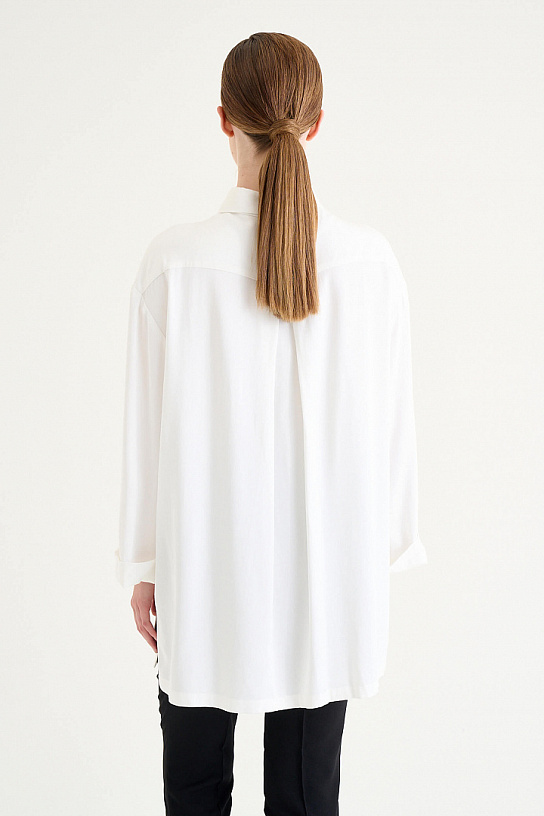 Women's white blouse made of cotton with embroidery
