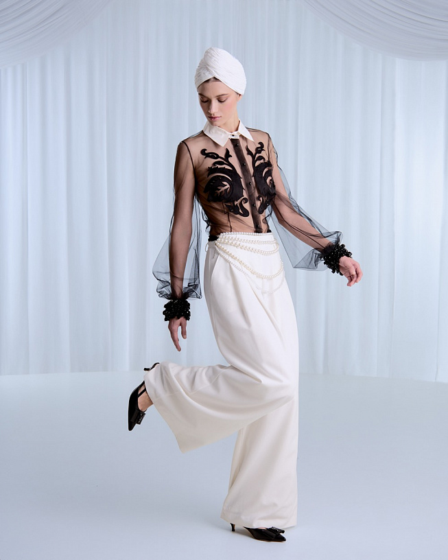 Black mesh blouse with appliqués