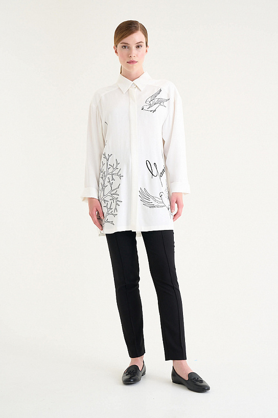 Women's white blouse made of cotton with embroidery
