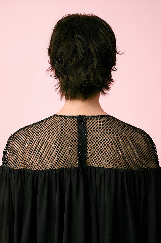 Blouse is black