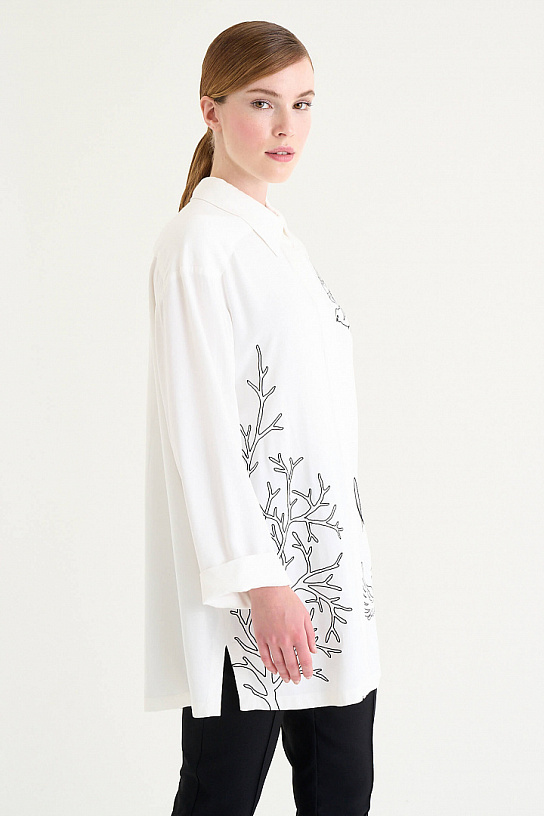 Women's white blouse made of cotton with embroidery