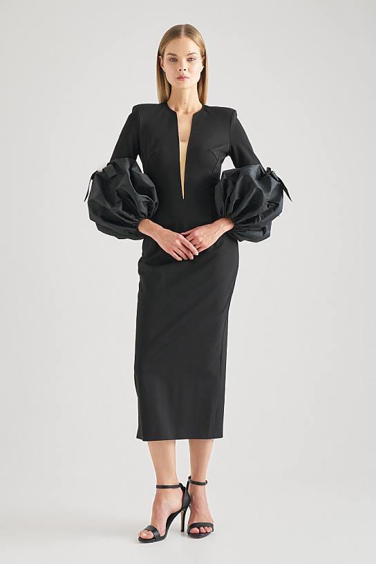 Black jersey dress with voluminous sleeves