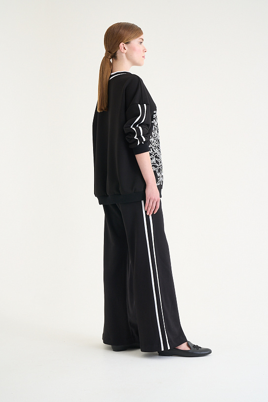 Women's black trousers from a footer with print