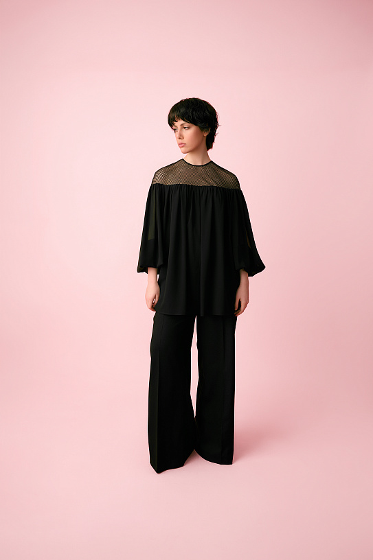 Blouse is black