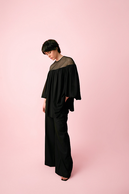 Blouse is black