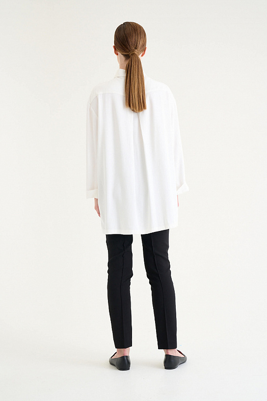 Women's white blouse made of cotton with embroidery