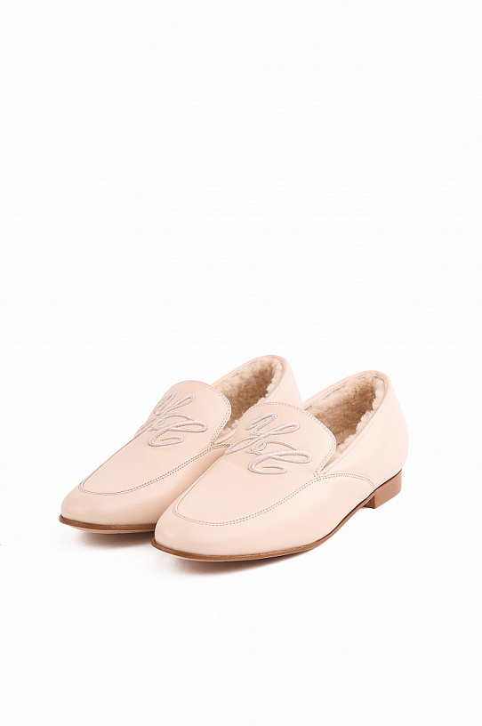 Beige leather loafers with embroidery